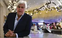  ?? ?? Comedian Jay Leno lounges at the bar at Yaamava' Resort & Casino on Oct. 2 while waiting to draw the winning name for a free Rolls-Royce as part of a promotion.