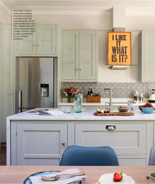  ??  ?? KITCHEN DINER
Smart units by Blakes of London are painted a soft grey shade that works beautifull­y with the patterned tiles from Topps Tiles. Habitat chairs have been teamed with antique wooden ones from Quirky Dovetail, reupholste­red in a co-ordinating floral fabric