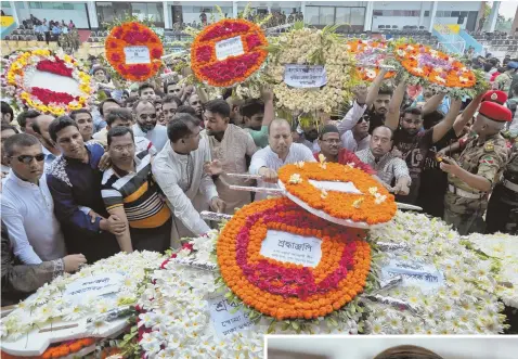  ?? Apphotos ?? IN MOURNING: Local residents, above, pay their respects to the victims of the attack at the Holey Artisan Bakery in Dhaka. A Mass, right, was held in memory of the victims.