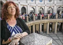  ?? RALPH BARRERA / AMERICAN-STATESMAN ?? Transgende­r community activist Stephanie Martinez stands in the outdoor rotunda of the Texas Capitol extension Friday, a day after she was lured to a meeting where she was carjacked and mugged.