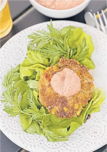  ?? GRETCHEN MCKAY/PITTSBURGH POST-GAZETTE ?? “Crabcakes are an essential part of Southern coastal cooking,” Alexander Smalls writes in “Meals, Music, and Muses.”