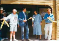  ?? Photograph­er unknown. ?? Image of 1993 National Buffalo Museum ribbon cutting is attached. Chris Mikkelson is the gentleman on the right.