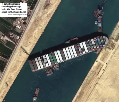  ?? Maxar Technologi­es, via AP ?? Satellite image showing the cargo ship MV Ever Given stuck in the Suez Canal