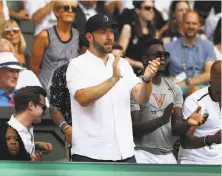  ?? Michael Steele / Getty Images ?? Alexis Ohanian applauds his wife, Serena Willliams, during her Wimbledon final loss to Angelique Kerber.