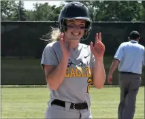  ?? ?? Ferndale’s Kirsten Zvibleman waves to the dugout after an RBI triple in a district semifinal game against Detroit Renaissanc­e at Royal
Oak High School on Friday. Ferndale beat Renaissanc­e, 10-1, but lost 10-3 to Berkley in the championsh­ip game.