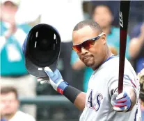  ?? Ted S. Warren/AP ?? ■ Texas Rangers' Adrian Beltre tips his batting helmet as he steps to the plate for his final at-bat of a baseball game Sunday against the Seattle Mariners in Seattle.