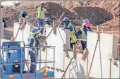  ??  ?? TEAM WORK: Workers tackle a challengin­g project in the KwaDabeka Valley.