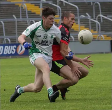  ??  ?? Jack Fortune of Crossabeg-Ballymurn and Mark Colfer of Bannow-Ballymitty battle for the ball.