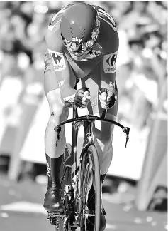  ??  ?? Christophe­r Froome sprints to win the 16th stage of the 72nd edition of “La Vuelta” Tour of Spain cycling race, a 40.2 km individual time trial from Circuito de Navarra in Los Arcos to Logrono. — AFP photo