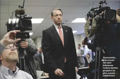  ?? PHOTO: AP ?? Rosenstein, who wrote the now infamous Comey memo, prepares to give a press conference