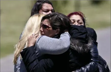  ?? ESTEBAN FELIX — THE ASSOCIATED PRESS ?? Relatives of missing submarine crew member Celso Oscar Vallejo, react to the news that a sound detected during the search for the ARA San Juan submarine is consistent with that of an explosion, at the Mar de Plata Naval Base in Argentina, Thursday.