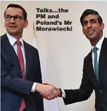  ?? ?? Talks...the PM and Poland’s Mr Morawiecki