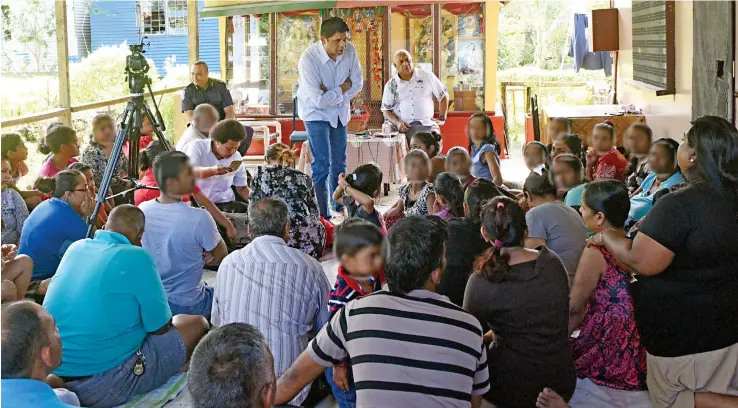  ?? Photo: Vilimoni Vaganalau ?? Attorney-General and Minister for Economy Aiyaz Sayed-Khaiyum and the Prime Minister Voreqe Bainimaram­a listen to one of the residents during their impromptu visit to Kuluvota Moala Settlement at Nadera in Nasinu. Accompanyi­ng them was Police...