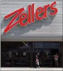  ?? CANADIAN PRESS FILE PHOTO ?? Customers leave a Zellers store in Lynn Valley in North Vancouver, B.C. in 2012.