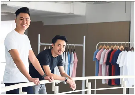  ?? — Photos: Buttonwell ?? Lai (left) and Goh believes that a Buttonwell T-shirt can be the go-to garment for everyone.