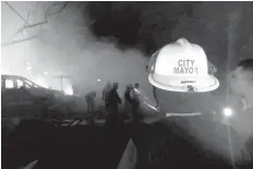  ??  ?? Lapulapu City Mayor Junard Chan supervises the firefighti­ng operations in Barangay Maribago Thursday evening. PHOTO FROM NAGIEL BANACIA