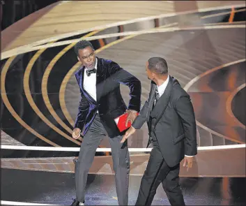  ?? Myung Chun
Los Angeles Times ?? The 94th Academy Awards in March were marred when Will Smith came onstage and slapped Chris Rock. The ratings were the second lowest in the show’s history.