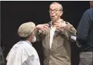  ??  ?? Director Joel Grey, center, works with Steven Skybell, as Tevye.