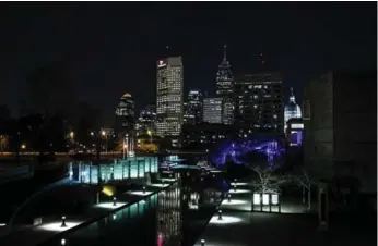  ?? TONI L. SANDYS PHOTOS/THE WASHINGTON POST ?? Downtown Indianapol­is seen from the Canal Walk, which is a waterside recreation­al trail.