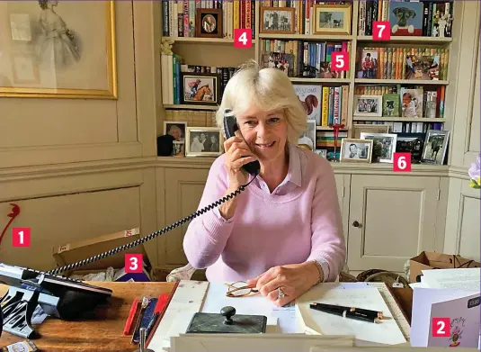  ??  ?? Homely chaos: Camilla’s office includes (1) her dog ball thrower (2) a £3 greeting card (3) a jumble of boxes (4) crime novels by Peter James (5) Harry Potter books (6) family photograph­s (7) snaps of her beloved pets