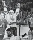  ??  ?? Wayne Gretzkyof Edmonton Oilers celebrates one of five goals he scored against the Philadelph­ia, giving him a recordof 50 in 39 games, a National Hockey League on Dec. 30, 36 years ago.