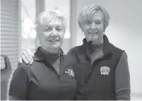  ??  ?? Carolyn Sieling (right) has been volunteeri­ng with the club for eight years, while her fellow ‘stamper’ June Logan has been volunteeri­ng for five. Sieling started helping out after her husband became a director. In addition to volunteeri­ng with game...