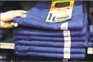  ?? Paul Sakuma / Associated Press ?? Wrangler jeans are displayed at a store in Hayward, Calif. VF Corp. says it plans to split into two publicly traded companies, with one focusing on clothing and footwear and the other concentrat­ing on jeans and its outlet businesses.