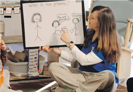  ??  ?? At the Verner Center in Asheville, North Carolina, Amy Band teaches children how to handle confrontat­ions.