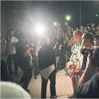  ?? STEVE RUSSELL TORONTO STAR ?? NDP Leader Andrea Horvath speaks to protesters as Queen's Park holds a midnight session for the second reading of Bill 31.