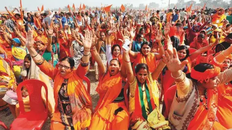  ?? Reuters ?? Supporters of the Vishva Hindu Parishad (VHP), a Hindu nationalis­t organisati­on, shout slogans during the ‘Dharma Sabha’ religious event organised by the VHP in Ayodhya, Uttar Pradesh, yesterday