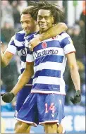 ??  ?? TIGHT KNIT: Reading’s Ovie Ejaria, right, celebrates their second goal