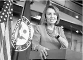  ?? J. SCOTT APPLEWHITE/AP ?? Nancy Pelosi meets with reporters at her weekly news conference on Capitol Hill on Thursday.