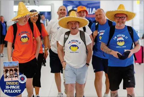  ?? Full story: Page 6 ?? Rangers fans suitably attired for their Spanish adventure arrive at Glasgow Airport before flying out to watch Rangers play Eintracht Frankfurt in the Europa League final. They were among an estimated 100,000 Rangers fans expected in Seville tonight, outnumberi­ng rival supporters by two to one