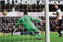  ?? Reuters ?? Tottenham’s Harry Kane’s shot is saved by West Bromwich Albion’s Ben Foster during a Premier League match yesterday.