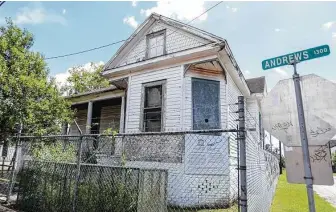  ??  ?? The former residence of the Rev. Ned Pullum on Andrews has fallen into disrepair.