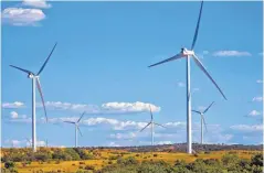  ?? [PHOTO BY
CHRIS LANDSBERGE­R, THE OKLAHOMAN ARCHIVES] ?? The Enel Green Power wind farm is seen in operation in Hennepin.