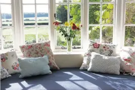  ?? Dreamstime/TNS ?? Installing a window seat in your home can give you a place to rest when life gets stressful.