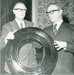  ??  ?? Lord Provost William Fitzgerald was presented with the first tyre produced at the Michelin factory by manager Thomas Ferguson.