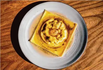  ?? ?? Raviolo di ricotta photograph­ed at Cotogna in San Francisco, Calif., Tuesday, Feb. 7, 2023.