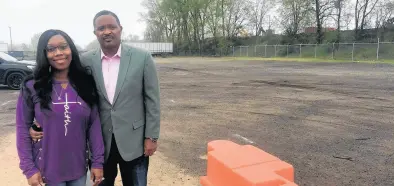  ?? JERRY DAVICH /POST-TRIBUNE ?? The Rev. W. Maurice White Jr. and his wife, Elisia, stand at the future site of the Harvest Square strip mall on the property of Beyond 4 Walls Christian Center in Gary’s Miller section.