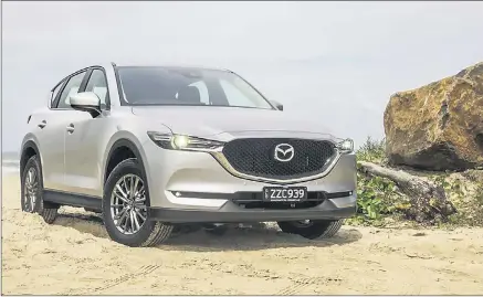  ??  ?? MIDNIGHT OIL: The flagship CX-5 Akera grade can now be optioned with Mazda’s latest 2.2-litre turbo-diesel four-cylinder unit that produces 140kw of power and 450Nm of torque.