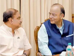  ?? — PTI ?? Union finance minister Arun Jaitley with Minister for parliament­ary affairs Ananth Kumar addresses the media regarding GST in New Delhi on Tuesday.