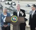  ?? Rich Pedroncell­i ?? The Associated Press Gov. Jerry Brown, center, criticizes a Trump administra­tion plan to freeze vehicle emissions standards Friday in Sacramento, Calif. Brown was joined by California Air Resources Board Chairwoman Mary Nichols and state Attorney General Xavier Becerra.