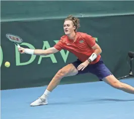  ?? TIM IRELAND/GETTY IMAGES FOR ITF ?? The USA's Sebastian Korda plays a return during his match against Ukraine's Oleksii Krutykh during the Davis Cup qualifier match on Thursday in Vilnius, Lithuania.