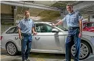  ??  ?? Police deputy commission­er Jevon McSkimming, left, and commission­er Andy Coster with a Skoda wagon.