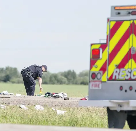  ?? LIAM RICHARDS ?? RCMP and Dalmeny firefighte­rs were on the scene Monday of a two-vehicle crash on Highway 16. Bettina Schuurmans, 55, of Elmira, Ont., died in the collision between the tractor she and her husband were on and a semi. The couple was on a tour promoting...