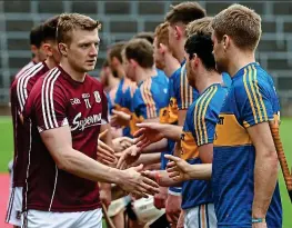  ?? SPORTSFILE ?? Hunting season (clockwise from above): Joe Canning greets Tipp players before League final win; Canning confronts Alan Nolan after finding the net in the goal-fest in 2015