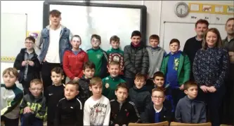  ?? Kerry star David Clifford meets the St Joseph’s NS pupils in Castlemain­e ??