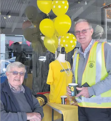  ??  ?? ■ Geoff Riley and Tim Nolan at the daffodil free fundraisin­g morning tea on Friday.