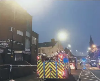  ??  ?? Fire crews outside the Ivy Leaf Club, in Hendon, on Wednesday night.